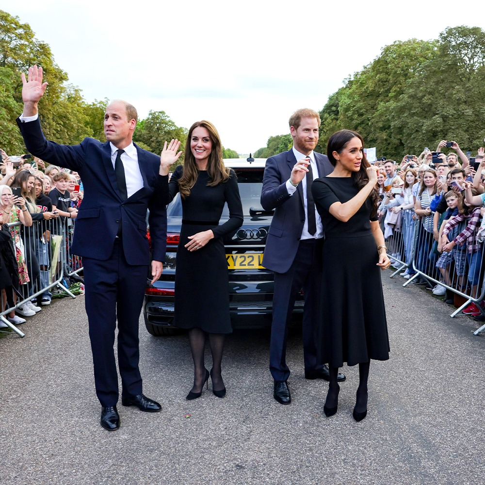 Harry and Meghan appear with William and Kate to greet mourners at Windsor Castle